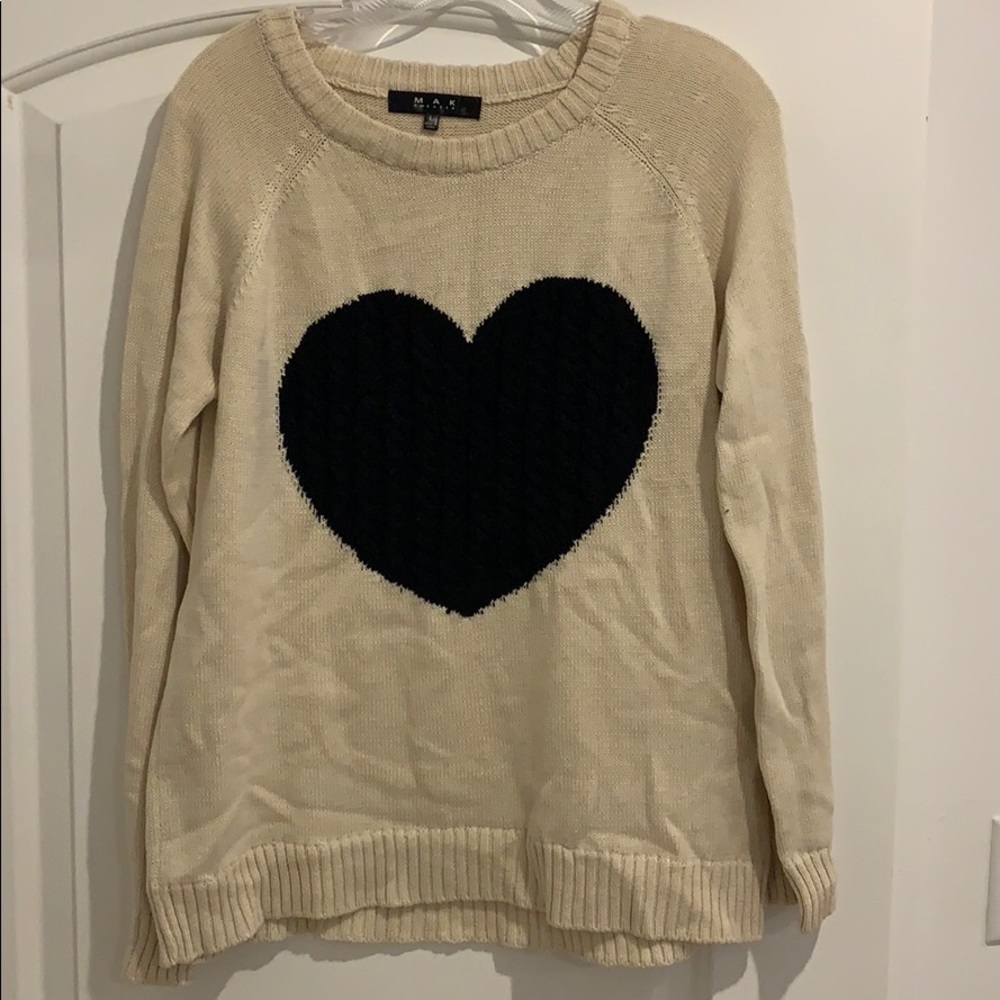 Heart cream and black sweater